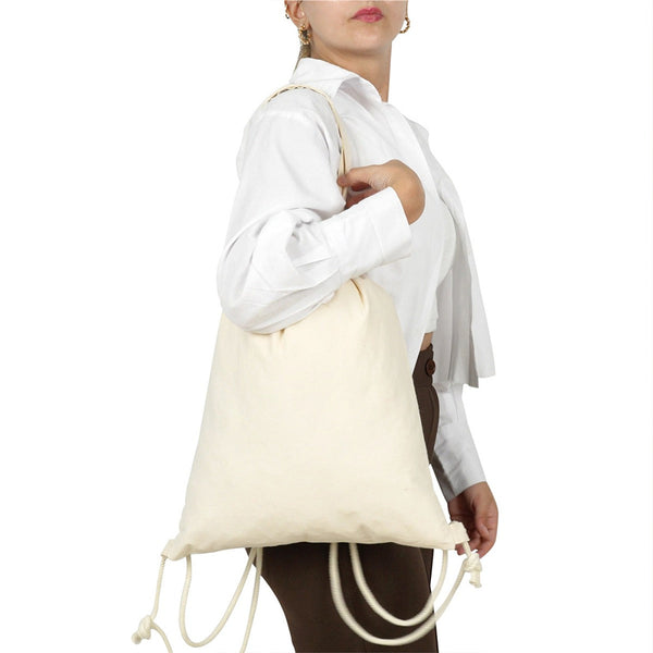 Mochila saco de Navidad llevada al hombro – Pamusan.es