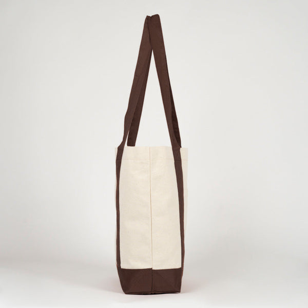Perfil lateral de la bolsa de lona con asa marrón oscuro - Pamusan.es