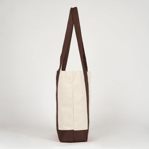Perfil lateral de la bolsa de lona con asa marrón oscuro - Pamusan.es