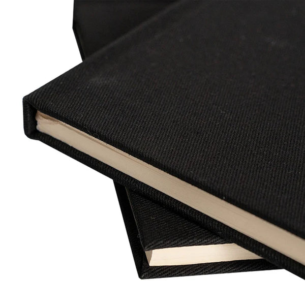 Close-up of the black cotton canvas cover texture on the A5 notebook | Pamusan.com
