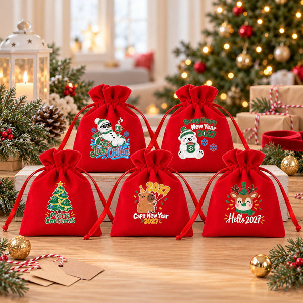 Cinco bolsitas de terciopelo rojo: galleta de jengibre, reno, ¡Feliz Navidad!, ¡Feliz Día de Reyes! y ¡Feliz 2027!
